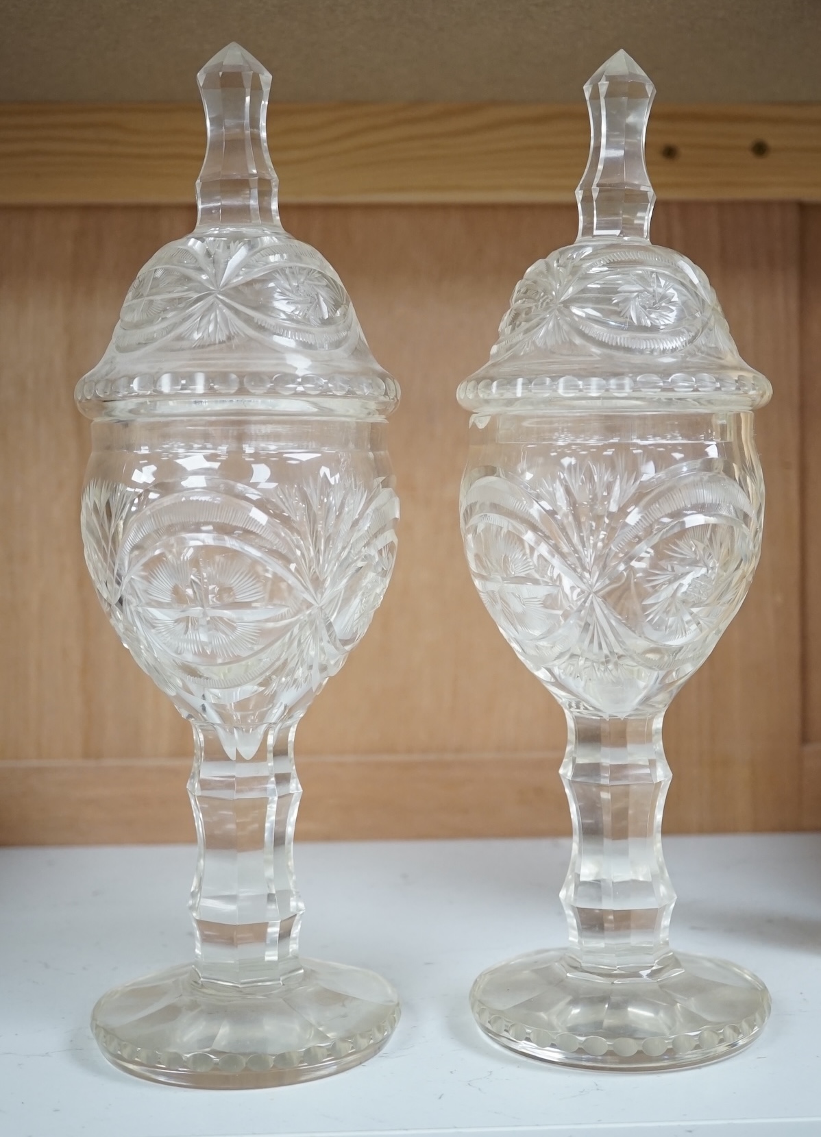 A pair of Bohemian glass sweetmeat vases and covers, 31cm. Condition - fair